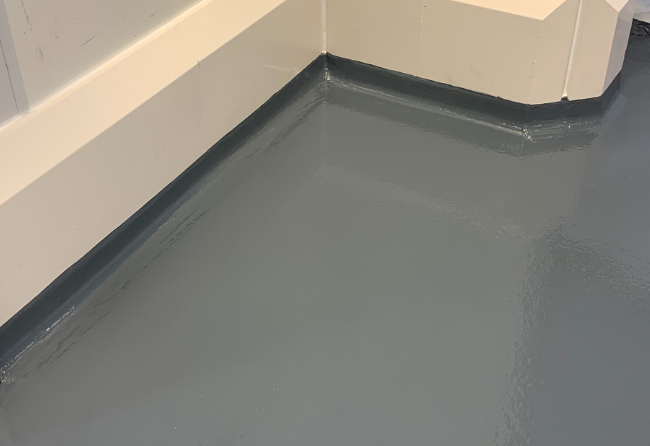 Blending Room Stonclad GS Flooring With Polysto Curbs